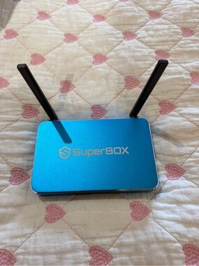 TP-Link blue dual-antenna SuperBOX wireless router